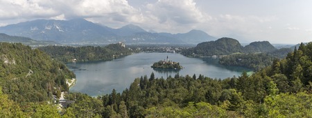 Panorama of Bled lake, town, medieval castle, island, church and Julian Alps in Slovenia. One of the picturesque sites of the nation.の写真素材