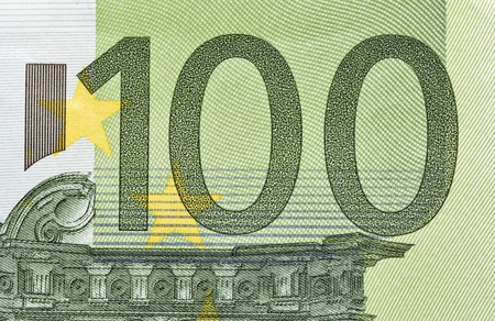 One hundred Euro banknote fragment closeup, front side