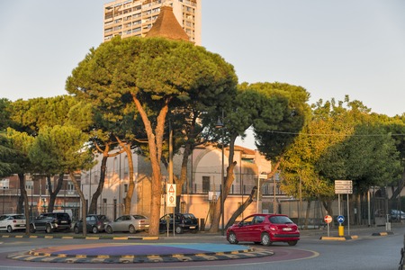 RIMINI, ITALY - SEPTEMBER 24, 2016: Girolamo Savonarola beautiful street with green pines in city center. Rimini is one of most famous Adriatic Sea resorts in Europe thanks to 15 km long sandy beach.のeditorial素材