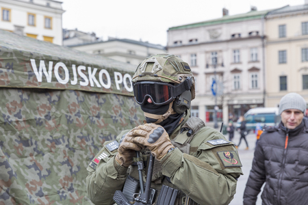 KRAKOW, POLAND - JANUARY 14, 2017: Welcome to American troops on Krakow Market Square during picnic Secure Poland dedicated to arriving of soldiers for strengthening of the eastern flank of NATO.のeditorial素材