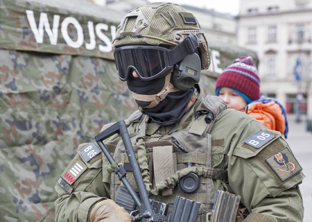 KRAKOW, POLAND - JANUARY 14, 2017: Welcome to American troops on Krakow Market Square during picnic Secure Poland dedicated to arriving of soldiers for strengthening of the eastern flank of NATO.のeditorial素材