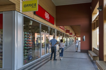 POLGAR, HUNGARY - SEPTEMBER 30, 2016: Unrecognized people visit M3 Shopping Mall just by the M3 highway leading to Debrecen and Nyiregyhaza.のeditorial素材