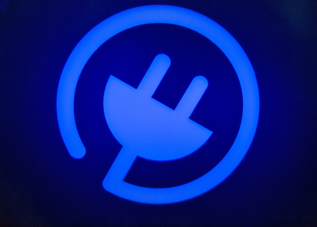 Power supply for electric car charging blue display closeupの写真素材