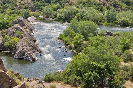 Southern Bug river landscape with famous rapid Red Gate or Integral in Migeya, Ukraine.