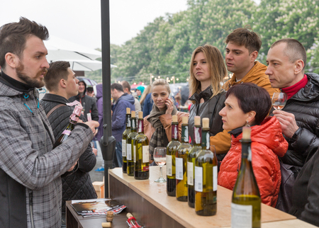 KIEV, UKRAINE - MAY 13, 2017: People visit booth of Ukrainian winery Inkerman on Kyiv Food and Wine Festival in National Expocenter, a permanent multi-purpose complex in the Teremky neighborhood.のeditorial素材