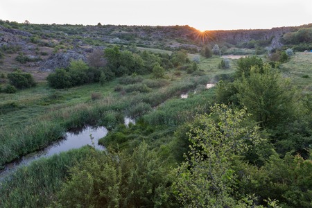 Sunrise in Aktove Canyon with Mertvovid river, Ukraine.の写真素材