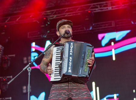 KIEV, UKRAINE - JUNE 28, 2017: Popular Ukrainian rock band Kozak System and its frontman, vocalist and accordionist Ivan Lenio performs at the Atlas Weekend Festival in National Expocenter.のeditorial素材