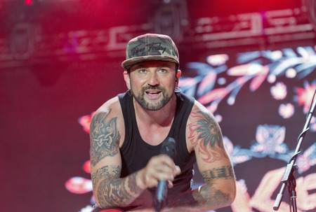 KIEV, UKRAINE - JUNE 28, 2017: Popular Ukrainian rock band Kozak System and its frontman, vocalist and accordionist Ivan Lenio performs live at the Atlas Weekend Festival in National Expocenter.のeditorial素材