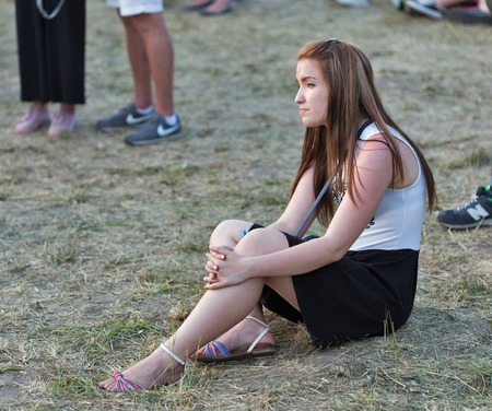 KIEV, UKRAINE - JUNE 29, 2017: Young fans visit music concert outdoors at the Atlas Weekend music festival in National Expocenter.のeditorial素材
