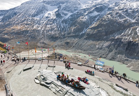 GROSSGLOCKNER, AUSTRIA - SEPTEMBER 23, 2017: Unrecognized people visit the observation platform of Kaiser Franz Joseph glacier. High Alpine Road in Austrian Alps.のeditorial素材