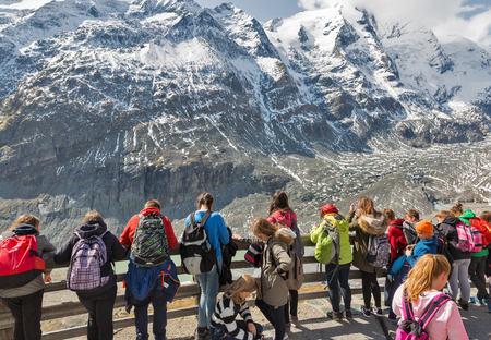 GROSSGLOCKNER, AUSTRIA - SEPTEMBER 23, 2017: Unrecognized people visit the observation platform of Kaiser Franz Joseph glacier. High Alpine Road in Austrian Alps.のeditorial素材