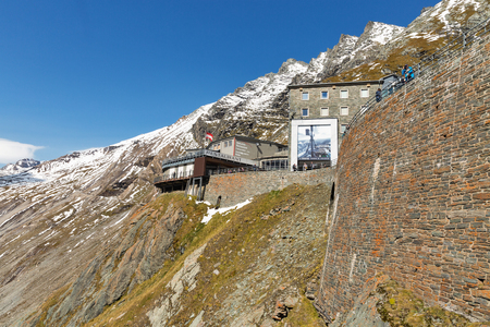 GROSSGLOCKNER, AUSTRIA - SEPTEMBER 23, 2017: Unrecognized people visit Gletscher restaurant, souvenir shop and the observation platform of Kaiser Franz Josef glacier. High Alpine Road in Austrian Alps.のeditorial素材