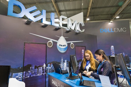 KIEV, UKRAINE - OCTOBER 07, 2017: Unrecognized presenters work on Dell Emc, an American data storage...