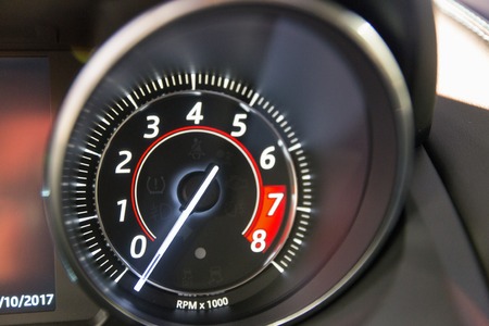 Modern car dashboard with tachometer closeupの写真素材