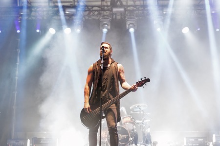 KIEV, UKRAINE - JULY 04, 2018: American Christian metal rock band Skillet and John Cooper, lead vocalist and bass guitarist performs live at the Atlas Weekend Festival in National Expocenter.のeditorial素材