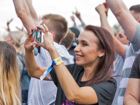 KIEV, UKRAINE - JULY 04, 2018: Fans crowd enjoy Belgian DJ Lost Frequencies live performance at the Atlas Weekend Festival in National Expocenter.のeditorial素材