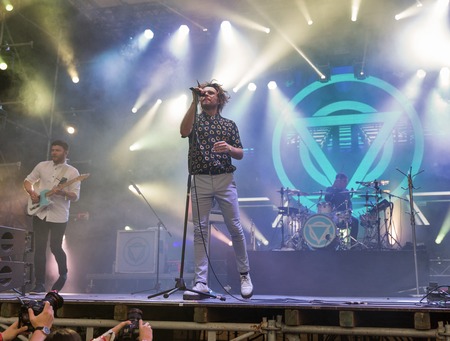 KIEV, UKRAINE - JULY 08, 2018: Enter Shikari, a British alternative post hardcore rock band and Rou Reynolds, lead singer and frontman performs live at Atlas Weekend Festival in National Expocenter.のeditorial素材