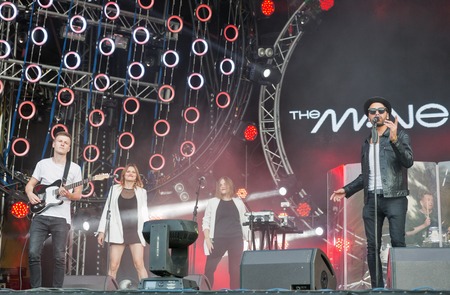 KIEV, UKRAINE - JULY 06, 2018: The Maneken, Ukrainian pop and rock band and its frontman Ewgen Filatow performs live at the Atlas Weekend Festival in National Expocenter.のeditorial素材