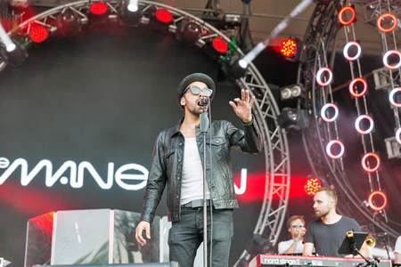 KIEV, UKRAINE - JULY 06, 2018: The Maneken, Ukrainian pop and rock band and its frontman Ewgen Filatow performs live at the Atlas Weekend Festival in National Expocenter.のeditorial素材