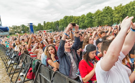 KIEV, UKRAINE - JULY 04, 2018: Fans crowd enjoy Belgian DJ Lost Frequencies live performance at the Atlas Weekend Festival in National Expocenter.のeditorial素材