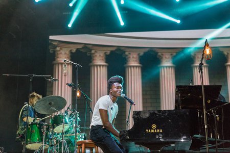 KIEV, UKRAINE - JULY 06, 2018: Benjamin Clementine, English artist, poet, vocalist, composer and musician performs live at the Atlas Weekend Festival in National Expocenter.のeditorial素材