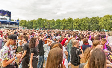 KIEV, UKRAINE - JULY 04, 2018: Fans crowd enjoy Belgian DJ Lost Frequencies live performance at the Atlas Weekend Festival in National Expocenter.のeditorial素材