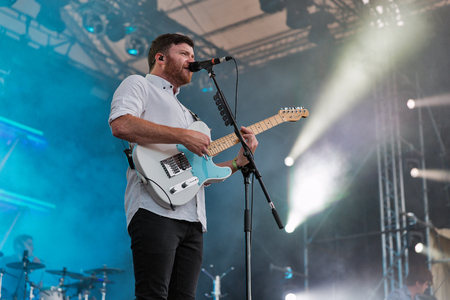 KIEV, UKRAINE - JULY 08, 2018: Enter Shikari, a British alternative post hardcore rock band and Rory Clewlow, lead guitarist performs live at Atlas Weekend Festival in National Expocenter.のeditorial素材