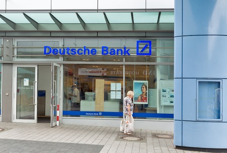 BERLIN, GERMANY - JULY 13, 2018: People visit Deutsche Bank in Markisches Zentrum Shopping Mall. It is a German global banking and financial services company with more than 100,000 employees.のeditorial素材