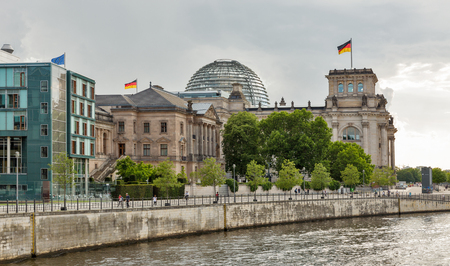 BERLIN, GERMANY - JULY 13, 2018: Cityscape of the Mitte district with Spree river, Reichstag or Bundestag and German Parliamentary Society buildings. Berlin is the capital and largest city of Germany.のeditorial素材