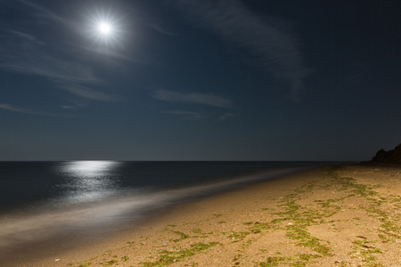 Night sea beach with moon. Black Sea, Ukraineの写真素材