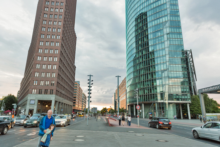 BERLIN, GERMANY - JULY 13, 2018: People walk along the Potsdamer platz financial district. Berlin is the capital and largest city of Germany by both area and population.のeditorial素材