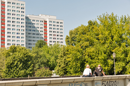 BERLIN, GERMANY - JULY 14, 2018: Unrecognized people have a rest on the bridge to Museums Island. Berlin is the capital and German largest city by area and population.のeditorial素材