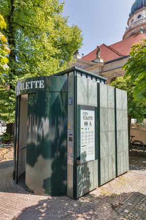 BERLIN, GERMANY - JULY 14,2018: Public portable city toilette. Wall GmbH is the German company providing street furniture. Berlin is the capital and German largest city by both area and population.のeditorial素材