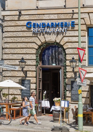 BERLIN, GERMANY - JULY 14,2018: People walk in front of Gendarmerie restaurant on Gendarmenmarkt square. Berlin is the capital and German largest city by both area and population.のeditorial素材