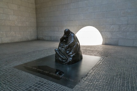 BERLIN, GERMANY - JULY 14, 2018: Sculpture Mother with Her Dead Son by K. Kollwitz in Neue Wache. It serves as the Central Memorial of the Germany for the Victims of War and Dictatorship.のeditorial素材