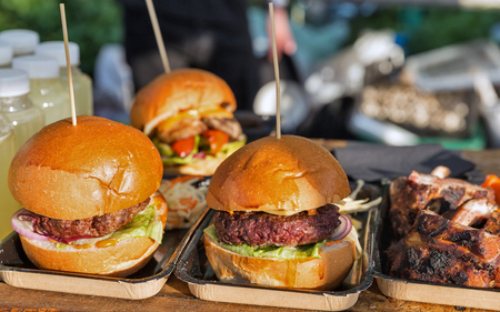 Street food hamburgers closeup outdoor at take away stallの写真素材