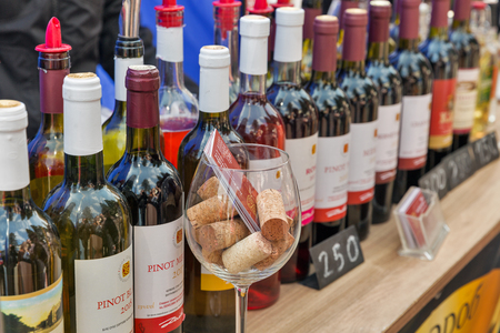 KYIV, UKRAINE - APRIL 21, 2019: Igor Zaika Ukrainian winery booth during Food and Wine Festival in National Expocenter, a permanent multi-purpose exhibition complex.のeditorial素材