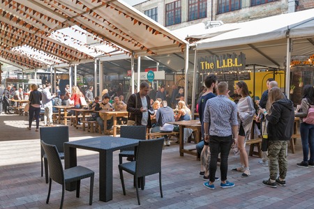 KYIV, UKRAINE - MAY 20, 2018: People enjoy food and craft beer during Kyiv Beer Festival vol. 3 in...