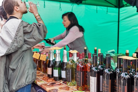 KYIV, UKRAINE - APRIL 21, 2019: People visit Maryan Shevchenko Ukrainian winery booth during Food...