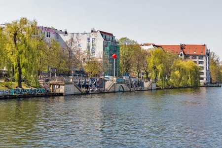 BERLIN, GERMANY - APRIL 18, 2019: People visit RioGrande restaurant on Spree river embankment. Berlin is the capital and largest city of Germany by both area and population.のeditorial素材