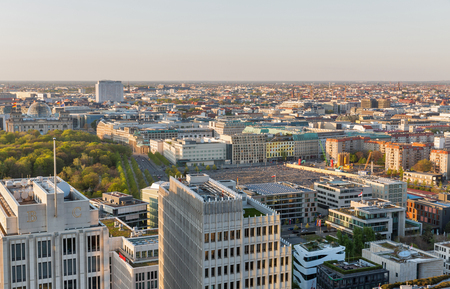 BERLIN, GERMANY - APRIL 18, 2019: Aerial cityscape with Memorial to the Murdered Jews of Europe, Tiergarten park, Reichstag and Charite hospital at sunset close to Potsdamer Square.のeditorial素材