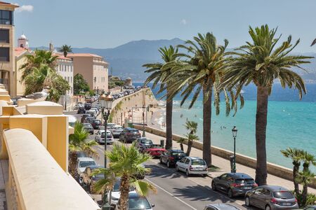 AJACCIO, CORSICA, FRANCE - JULY 13, 2019: Cars parked in front of Municipal Casino and city beach. Ajaccio, the largest settlement on the islandis located on the west coast of Corsica.のeditorial素材