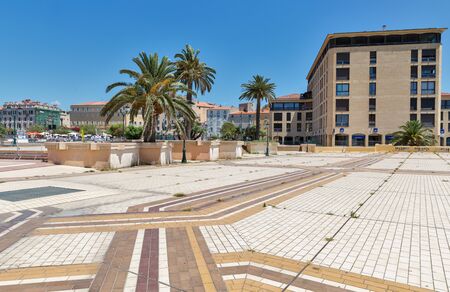 AJACCIO, CORSICA, FRANCE - JULY 13, 2019: General de Gaulle square with palm trees and Municipal Casino roof tile. Ajaccio, largest settlement on the island is located on the west coast of Corsica.のeditorial素材