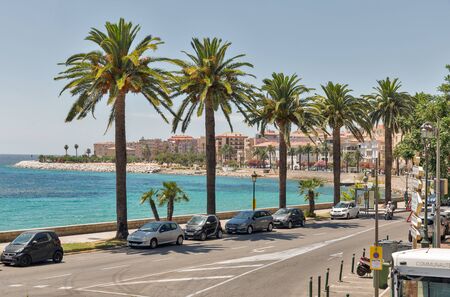 AJACCIO, CORSICA, FRANCE - JULY 13, 2019: Cars parked along Boulevard Pascal Rossini with city beach. Ajaccio, the largest settlement on the islandis located on the west coast of Corsica.のeditorial素材