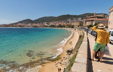 AJACCIO, CORSICA, FRANCE - JULY 13, 2019: People visit Boulevard Pascal Rossini with city St. Francis beach. Ajaccio, the largest settlement on the island is located on the west coast of Corsica.のeditorial素材