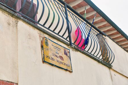MONTOPOLI IN VAL D'ARNO, ITALY - JULY 24, 2019: Municipal Police old ceramic plate. It is a...