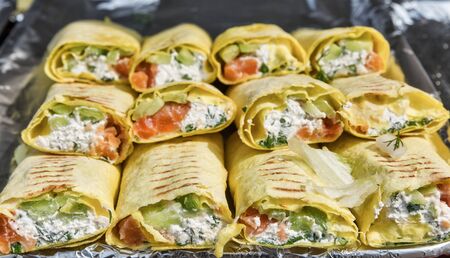 fast food pita bread with soft cheese and salmon closeupの写真素材