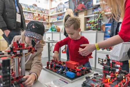 KYIV, UKRAINE - APRIL 06, 2019: Kids visit engineering kit toys producer booth during CEE 2019, the...