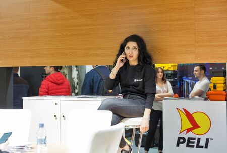 KYIV, UKRAINE - APRIL 06, 2019: People visit Pelican Products booth, a company that manufactures temperature controlled packaging and protective cases at CEE 2019, largest electronics show of Ukraine.のeditorial素材