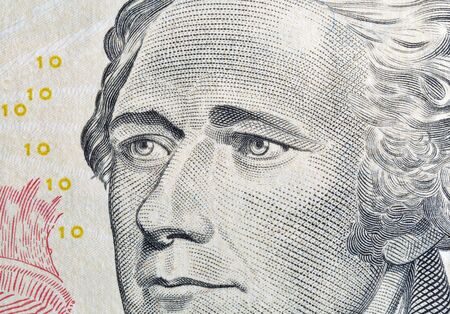 Portrait of the US President Alexander Hamilton on ten dollar banknote bill, front side obverse,...